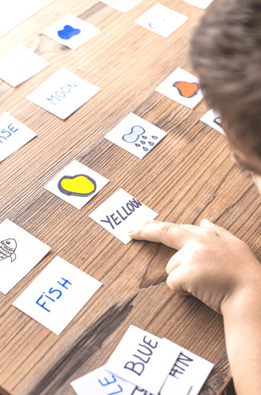 kids playing word and picture matching game